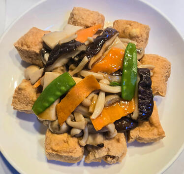 • Braised Mixed Mushrooms over Tofu $19.00